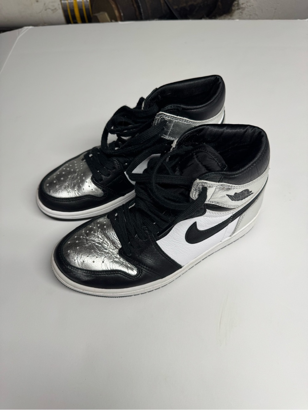 Nike Women’s Air Jordan 1 Mid — Black, White & Metallic Silver